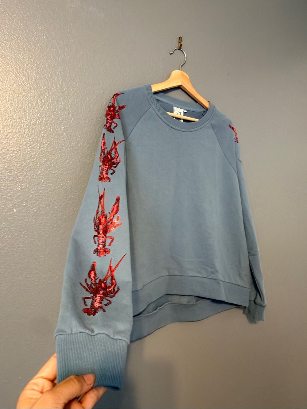 Queen of Sparkles Blue Crewneck Sweater with Red Sequin Lobster  Medium